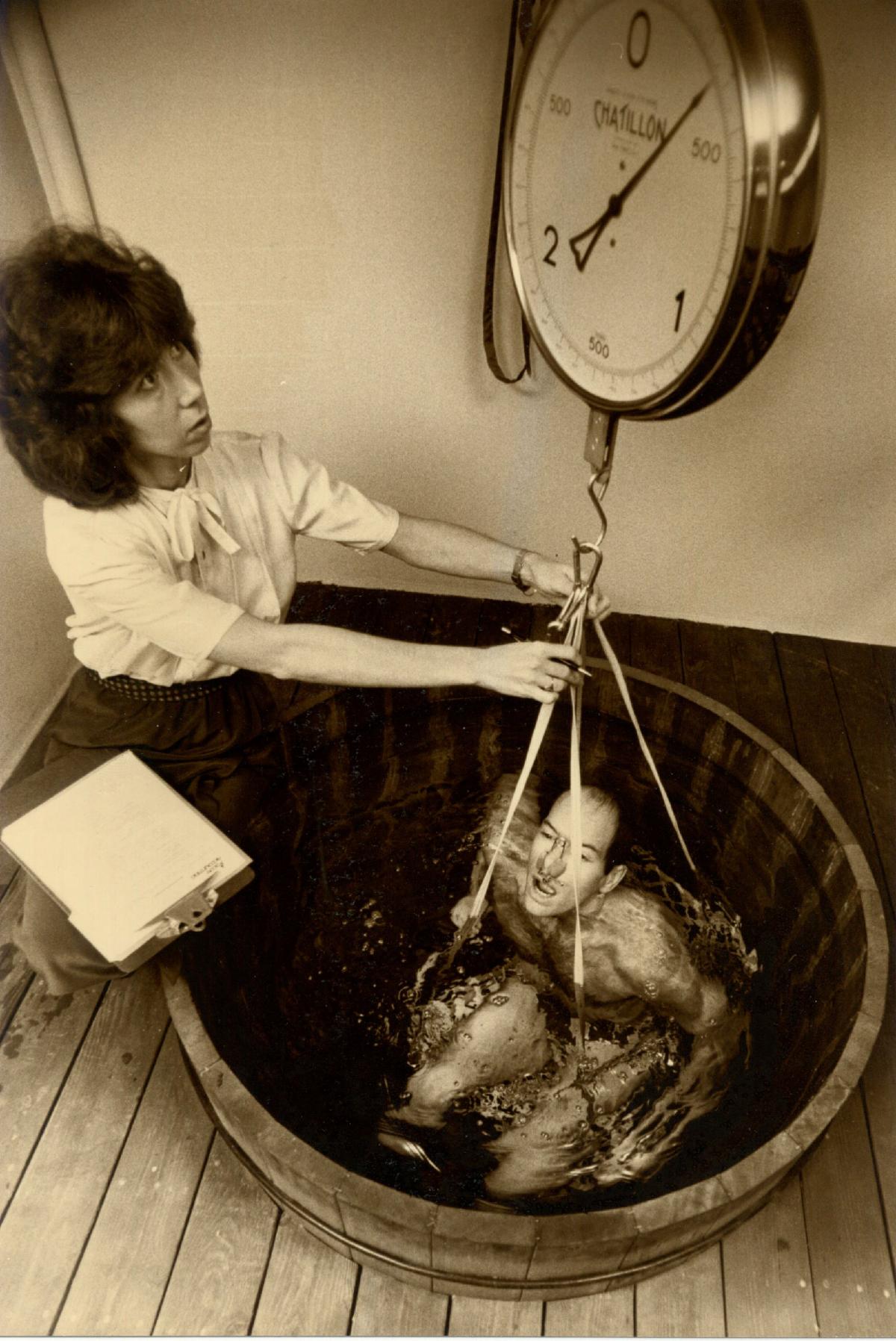 Joe Dillon being hydrostatically weighed, 1982