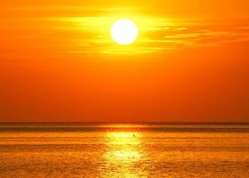 Orange sunset over water